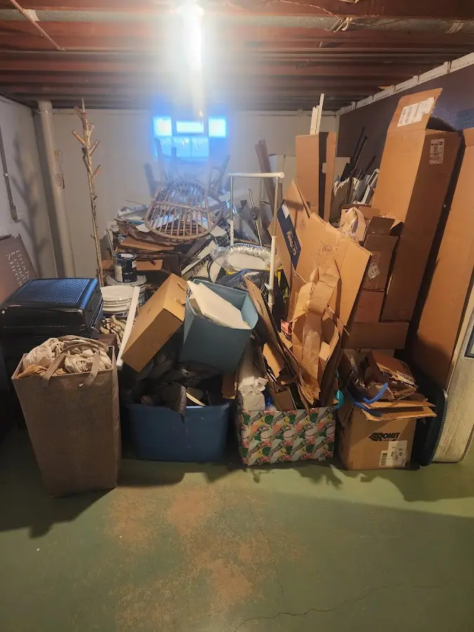 Roll-off dumpster container at job site for Construction Dumpster Rental in DeWitt